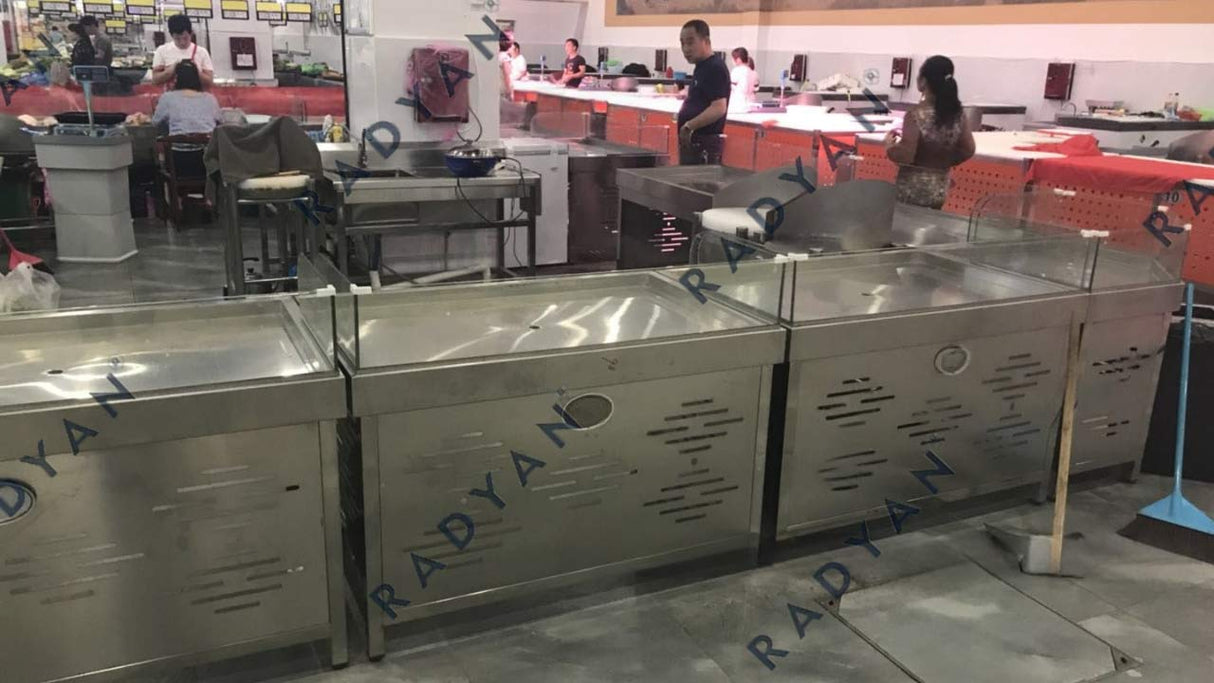 Farmers market transformation with fruit and vegetable racks, dividing table and fish pond