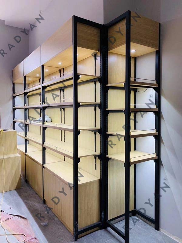 Supermarket convenience store steel and wood shelves against the wall