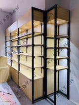 Supermarket convenience store steel and wood shelves against the wall
